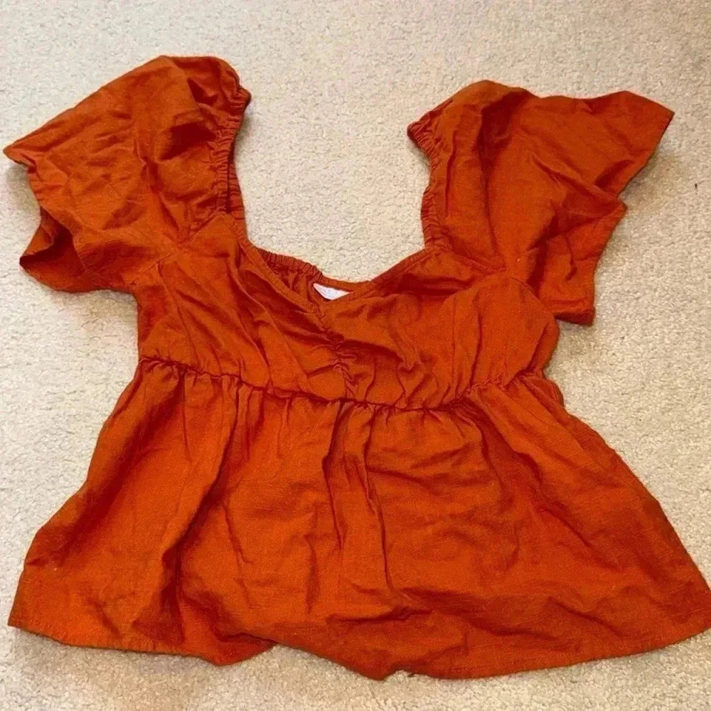 orange crop shirt with puff sleeves